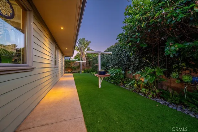 a living room with furniture flat screen tv and a fireplace
