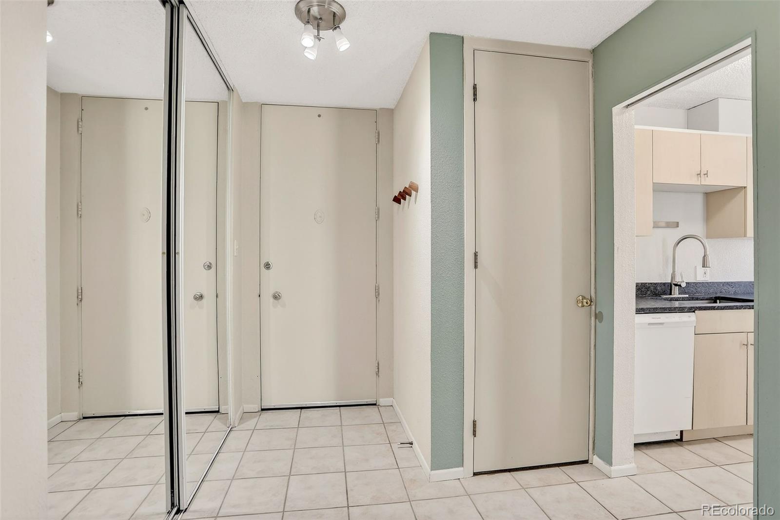2500 South York Street, Unit 401 Denver, CO 80210 - Photo 6 of 30 a bathroom with a shower and a sink