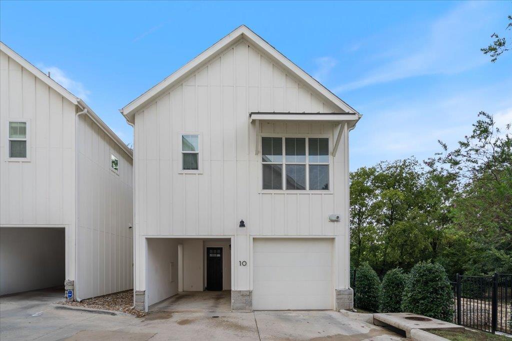 2624 Metcalfe Road, Unit 10 Austin, TX 78741 - Photo 1 of 27 View of front of home featuring board and batten siding