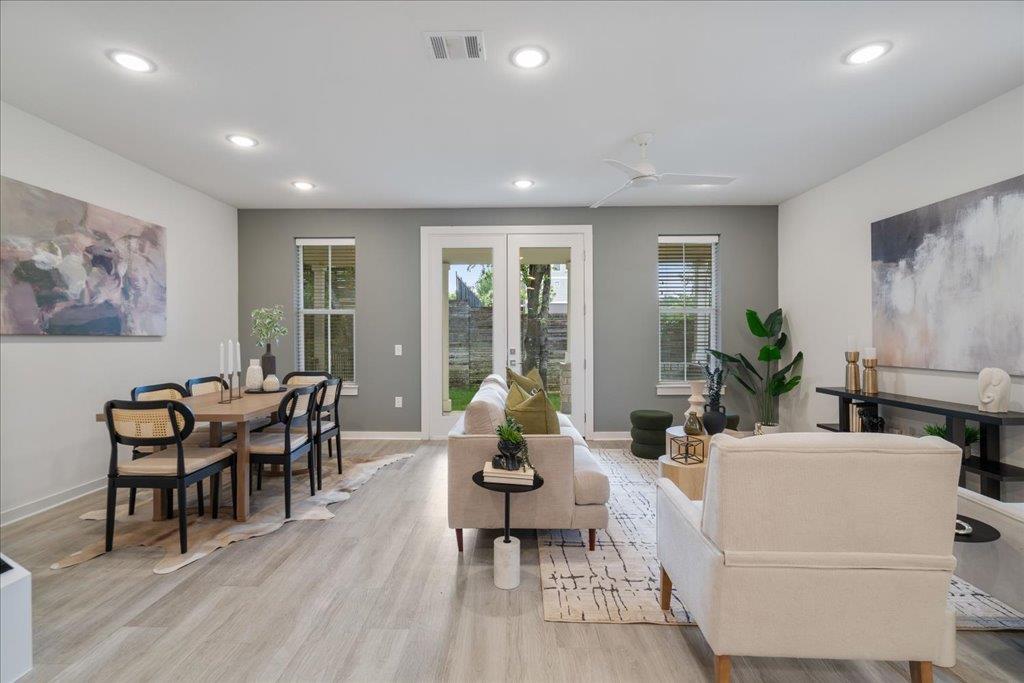 2624 Metcalfe Road, Unit 10 Austin, TX 78741 - Photo 8 of 27 Living area featuring light wood-type flooring, a ceiling fan, french doors, and recessed lighting