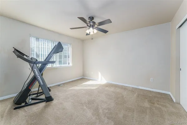 a utility room with sink dryer and washer
