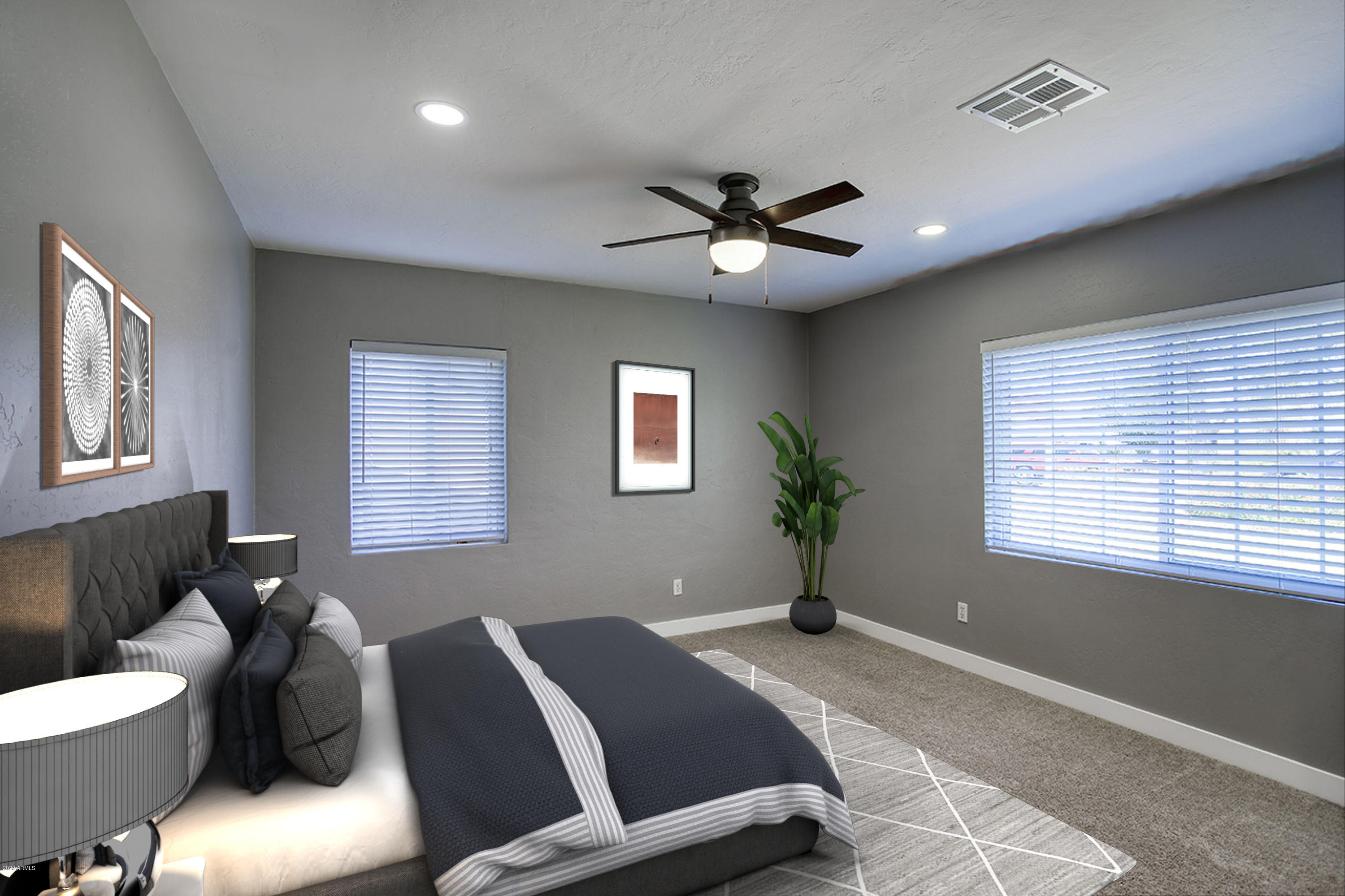 1423 East Granada Road Phoenix, AZ 85006 - Photo 15 of 25 a bedroom with a bed couch and a window