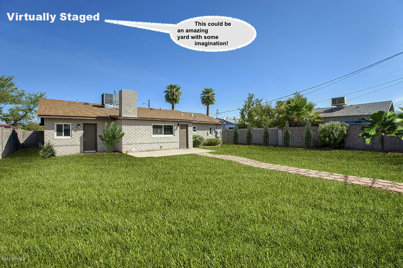 1423 East Granada Road Phoenix, AZ 85006 - Photo 20 of 25 a view of a house with a yard