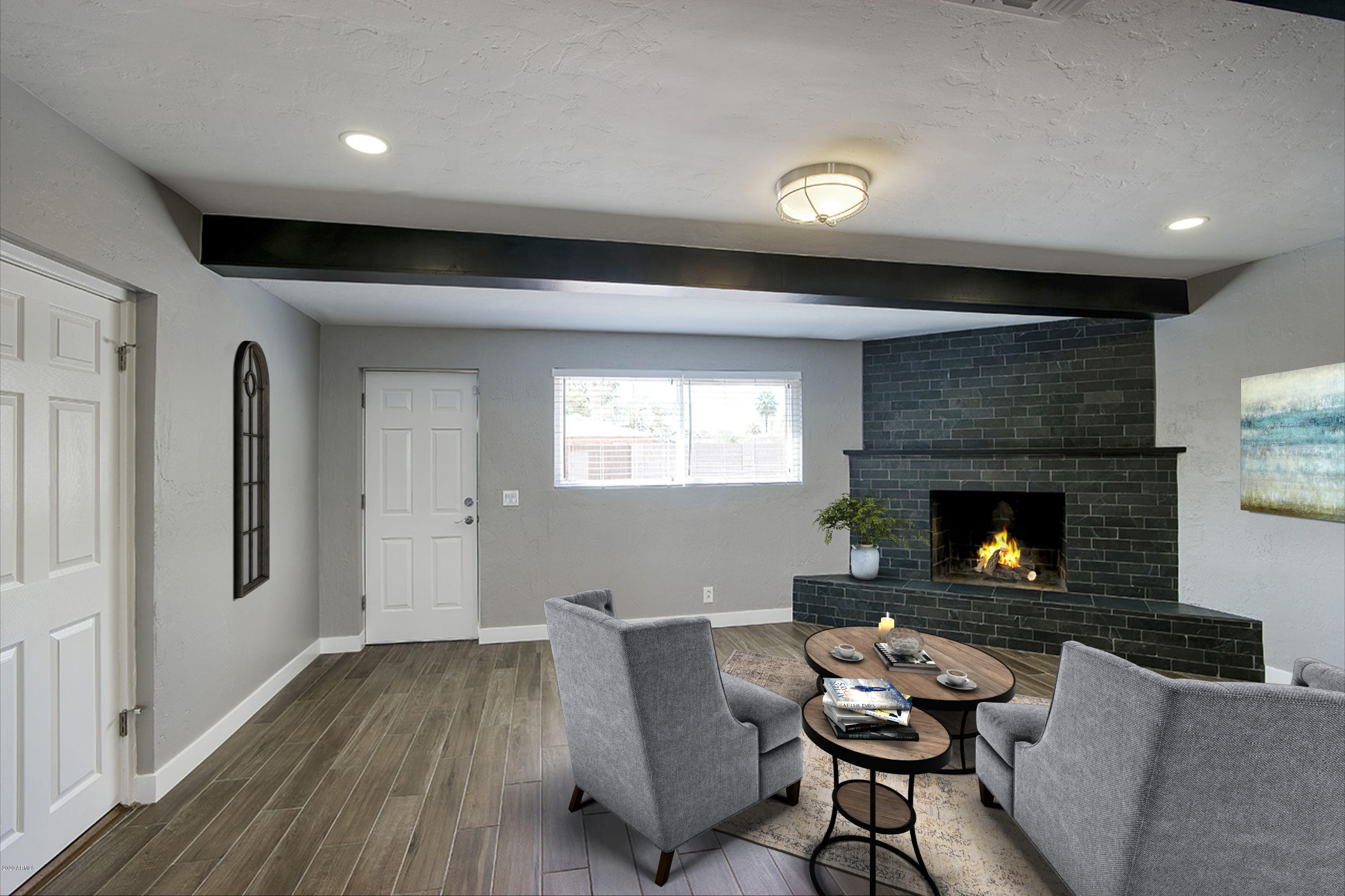 1423 East Granada Road Phoenix, AZ 85006 - Photo 5 of 25 a living room with furniture and a fireplace