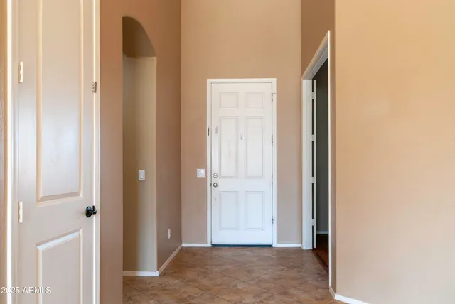 a view of a room that has a door in it