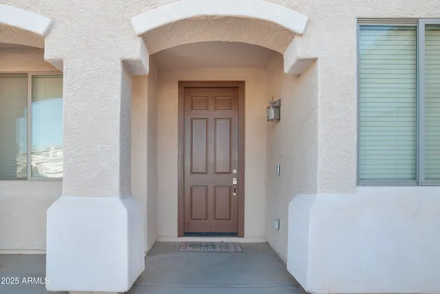 a view of a hallway with windows