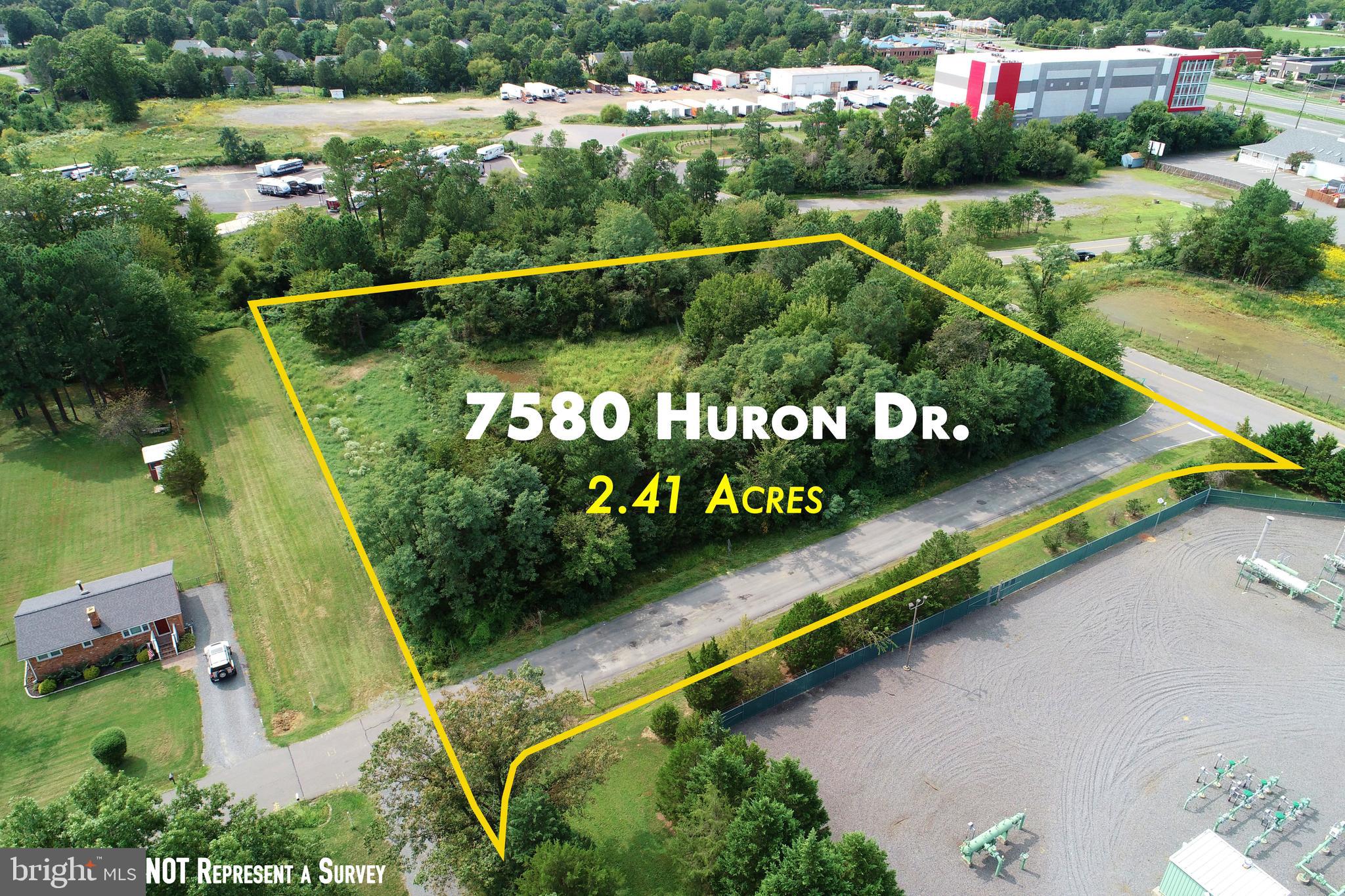 7580 Huron Drive Gainesville, VA 20155 - Photo 2 of 10 an outdoor space with swimming pool and outdoor seating