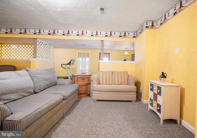 a view of a backyard with swimming pool