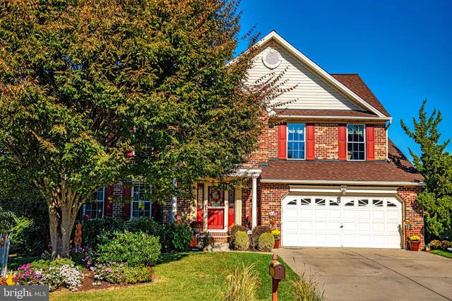 a front view of house with yard