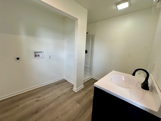 527 12th Street Peru, IL 61354 - Photo 9 of 15 a room with a sink and mirror