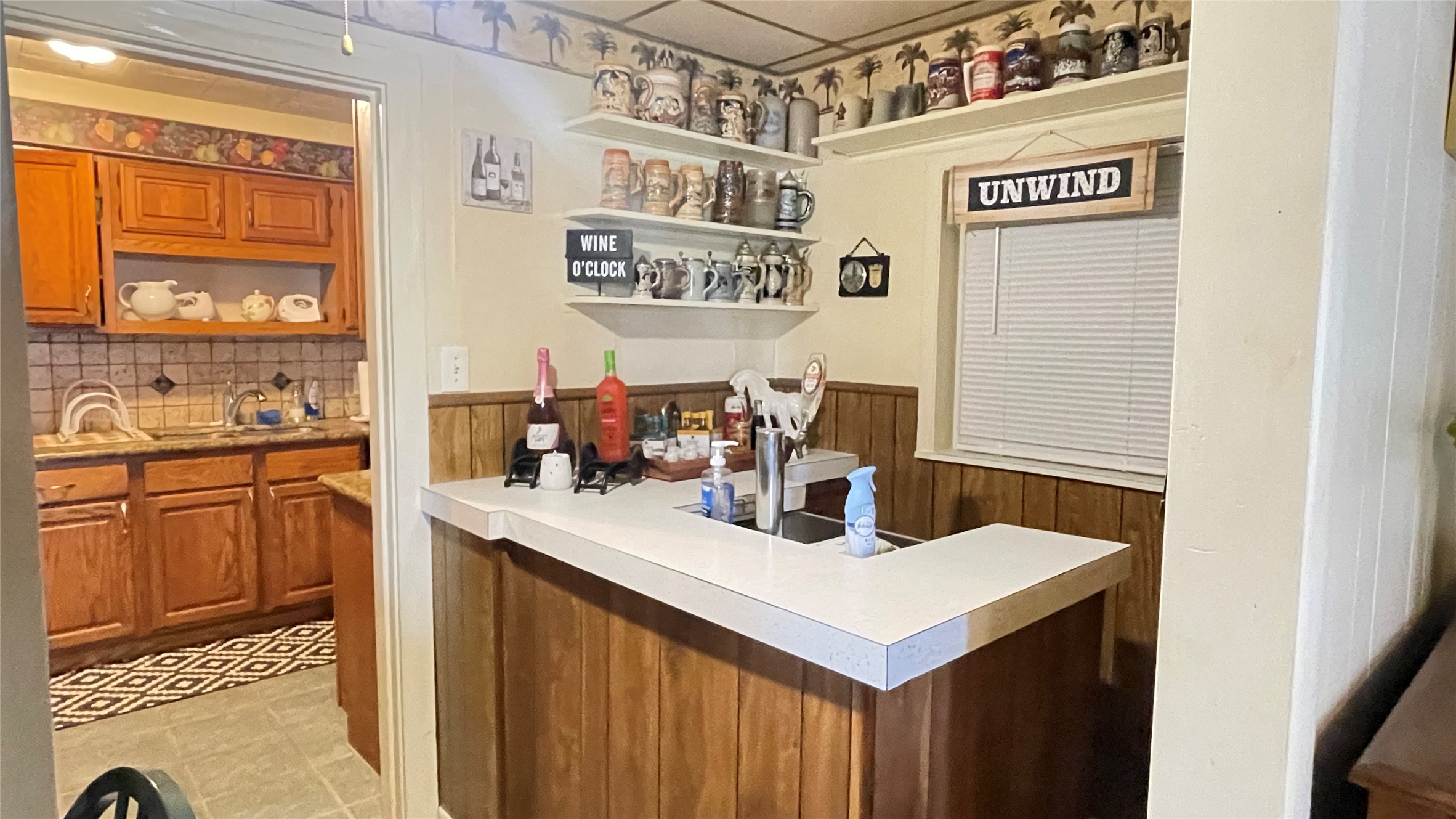 17 Manor Way Galveston, TX 77550 - Photo 13 of 23 a kitchen with a sink cabinets and window