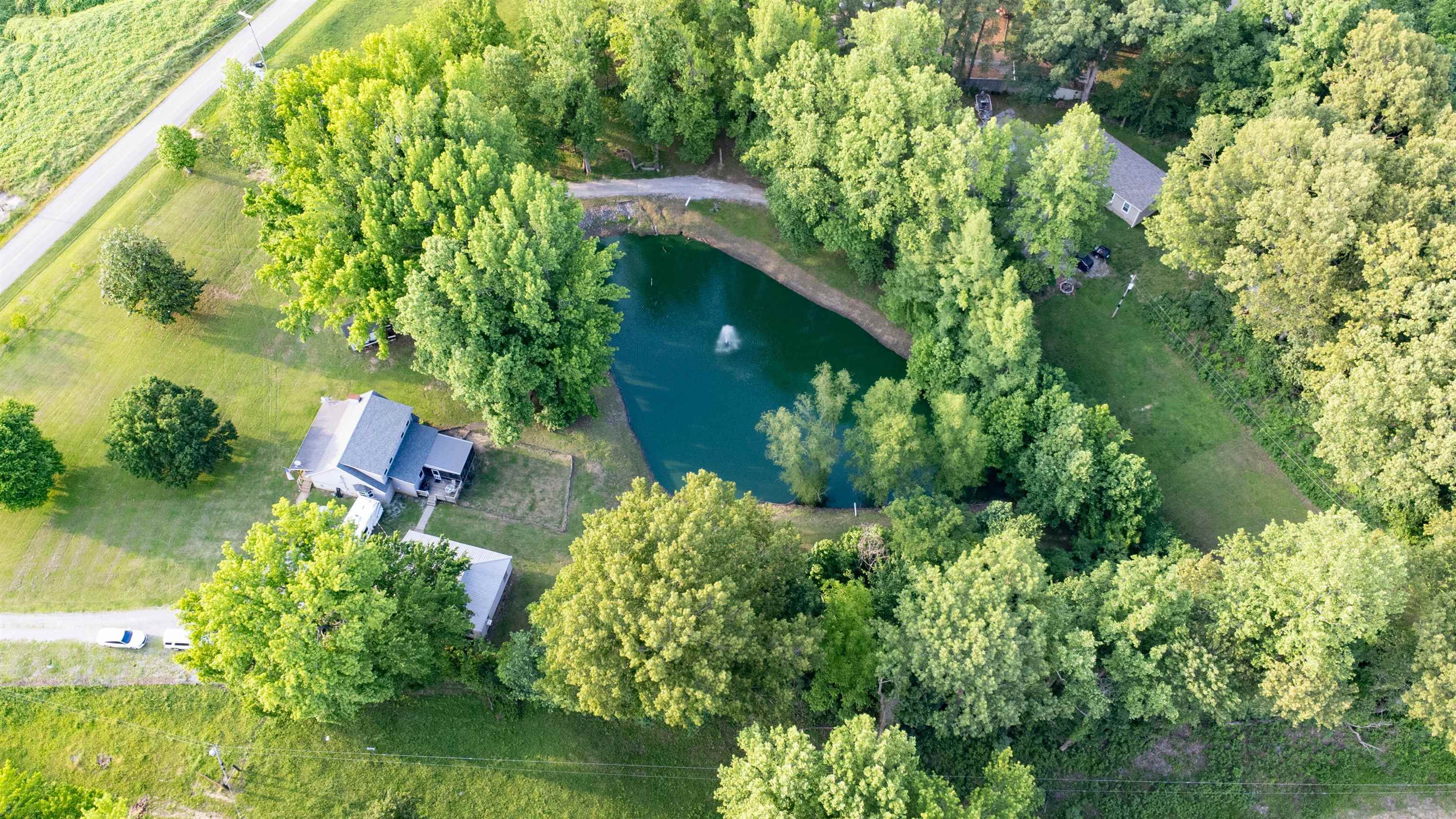 190 Craig Road Ripley, TN 38063 - Photo 2 of 40 an aerial view of residential house with outdoor space and trees all around