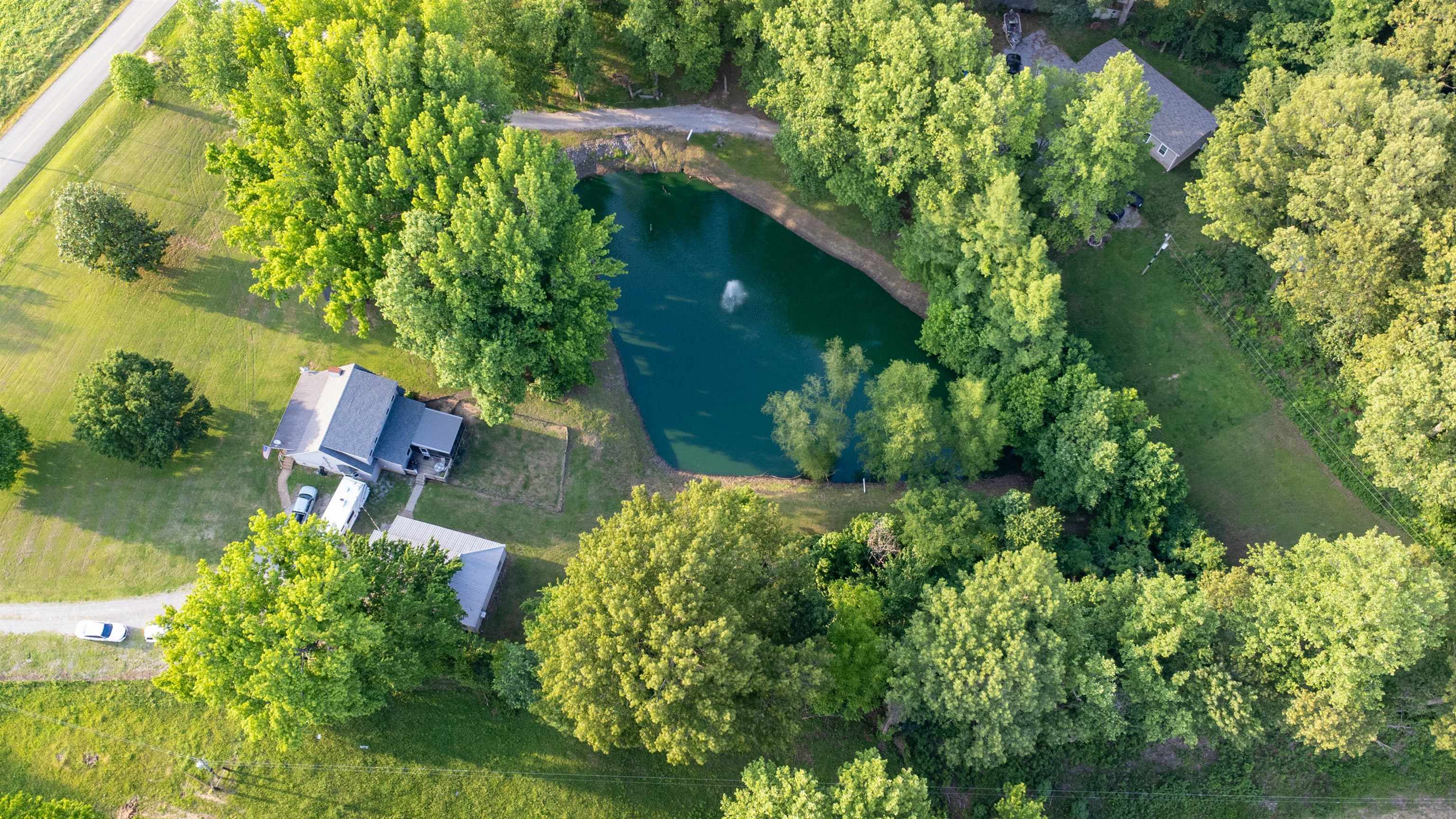 190 Craig Road Ripley, TN 38063 - Photo 3 of 40 an aerial view of a house with pool yard outdoor seating and yard