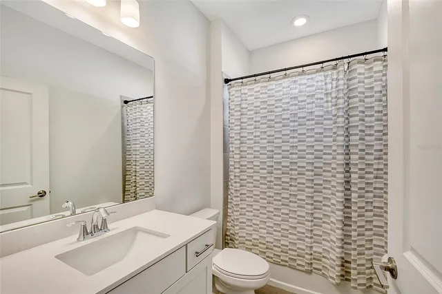 a view of a hallway with an empty room