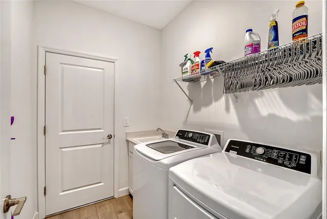 a view of an outdoor space and tennis court