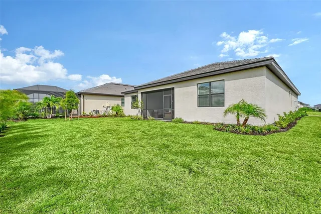 a view of a park with swings and slides