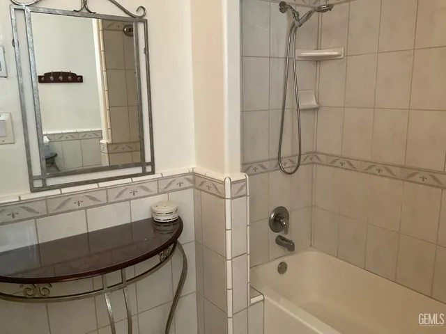 a bathroom with a toilet and a sink