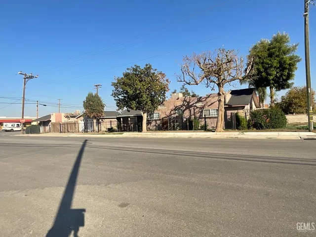 a view of street with houses