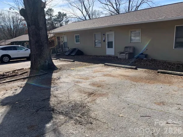 a house view with a backyard space