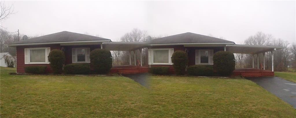 2614 Old Pittsburgh Road New Castle, PA 16101 - Photo 16 of 16 a front view of a house with yard
