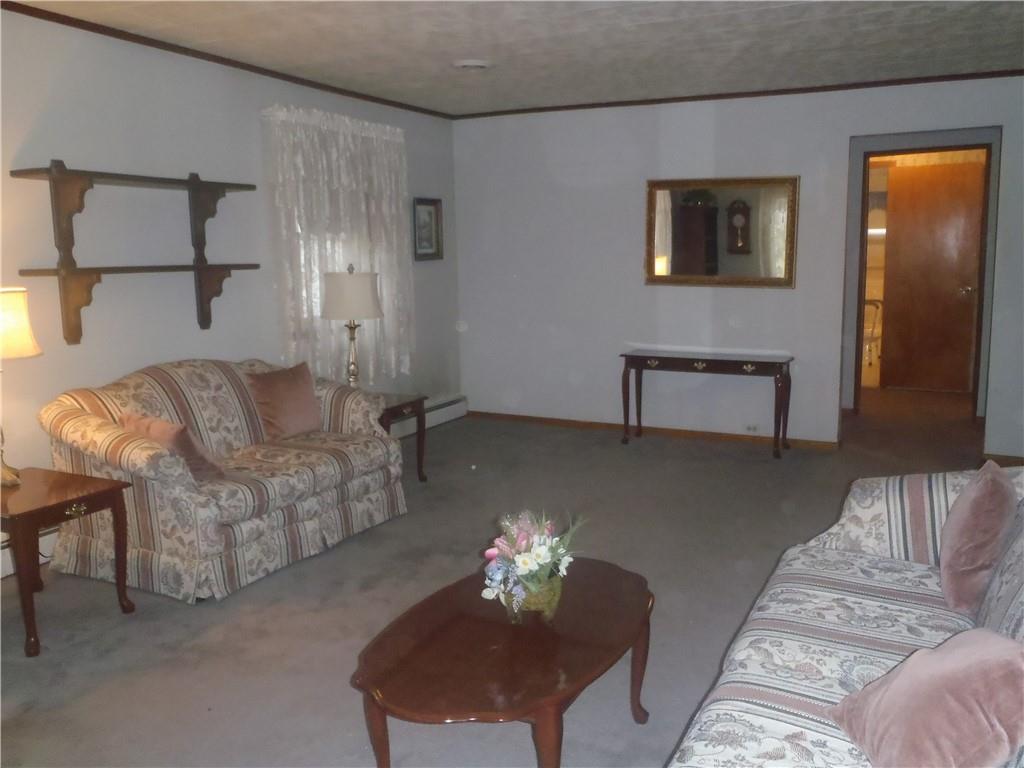 2614 Old Pittsburgh Road New Castle, PA 16101 - Photo 3 of 16 a living room with furniture and a lamp