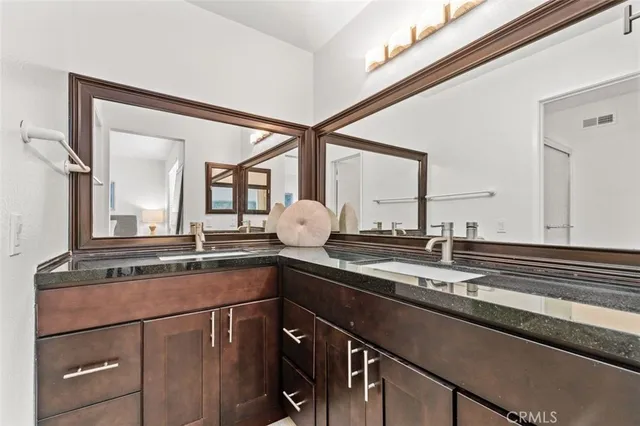 a kitchen with a sink and a cabinets