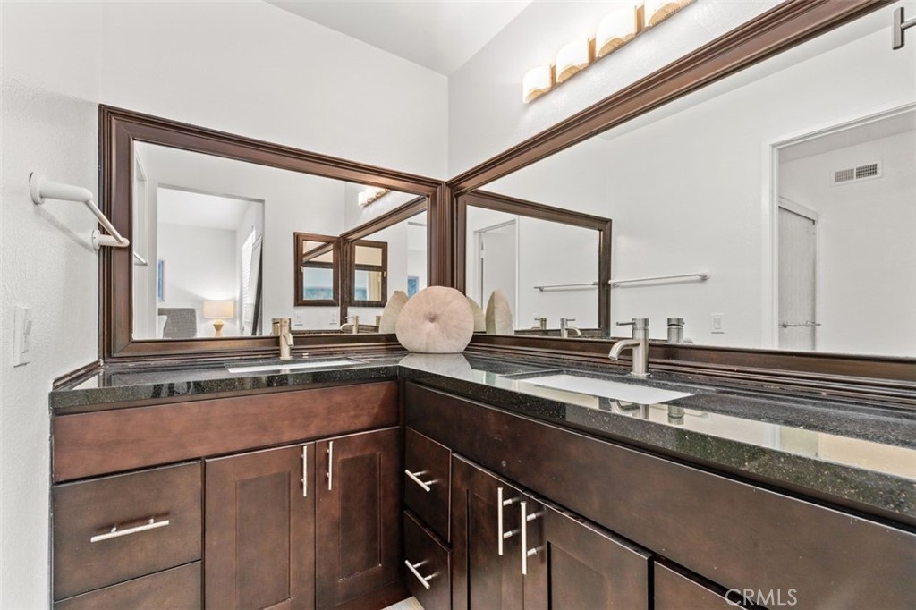 28101 Montecito, Unit 15 Laguna Niguel, CA 92677 - Photo 17 of 44 a kitchen with a sink and a cabinets