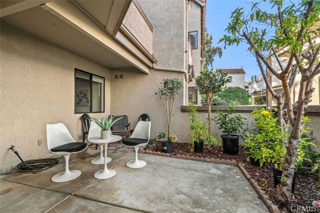 28101 Montecito, Unit 15 Laguna Niguel, CA 92677 - Photo 25 of 44 a view of swimming pool with outdoor seating and plants