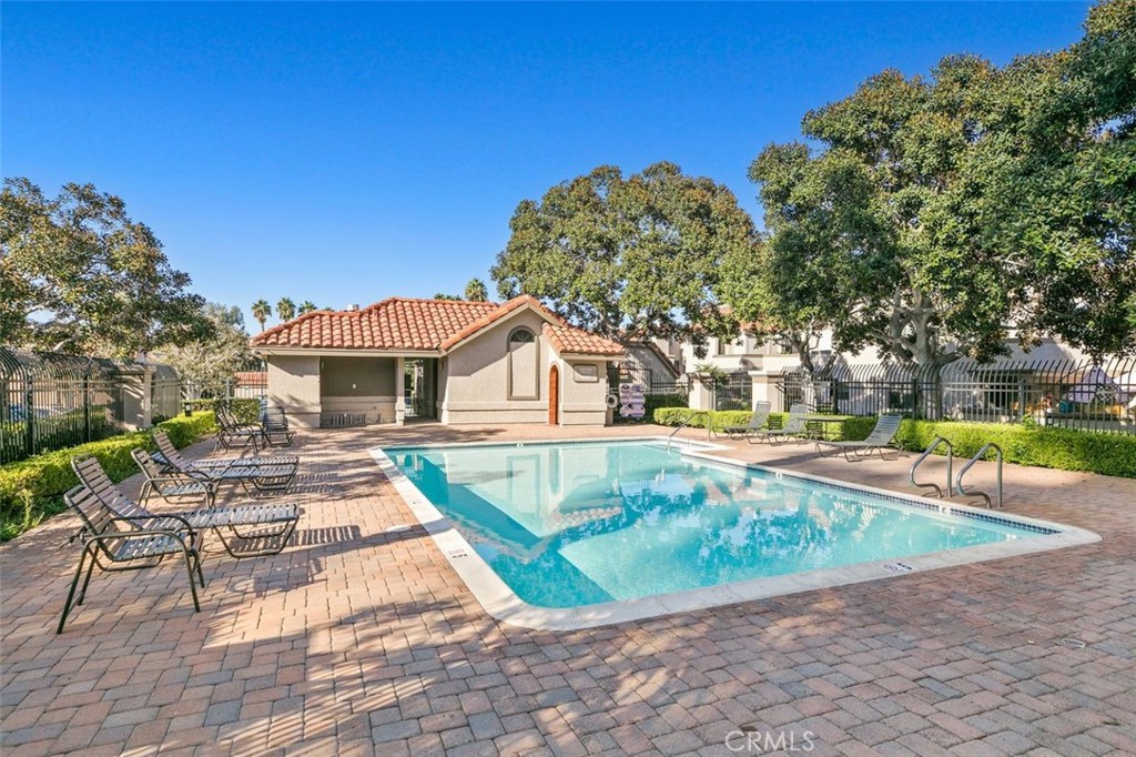 28101 Montecito, Unit 15 Laguna Niguel, CA 92677 - Photo 38 of 44 a view of a house with swimming pool and sitting area