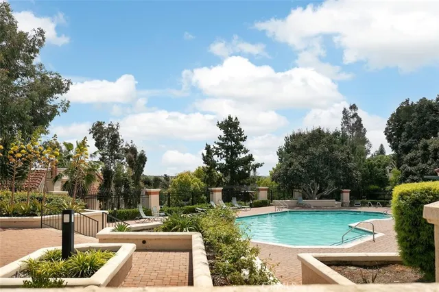 a view of a playground with basketball court