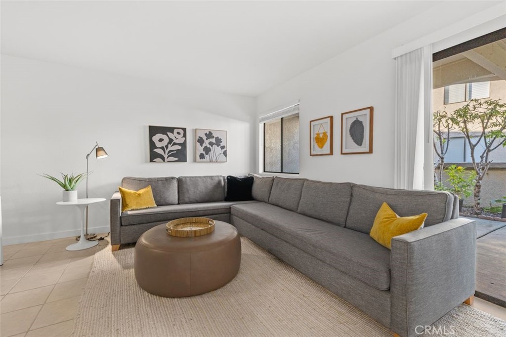 28101 Montecito, Unit 15 Laguna Niguel, CA 92677 - Photo 5 of 44 a living room with furniture and painting on the wall