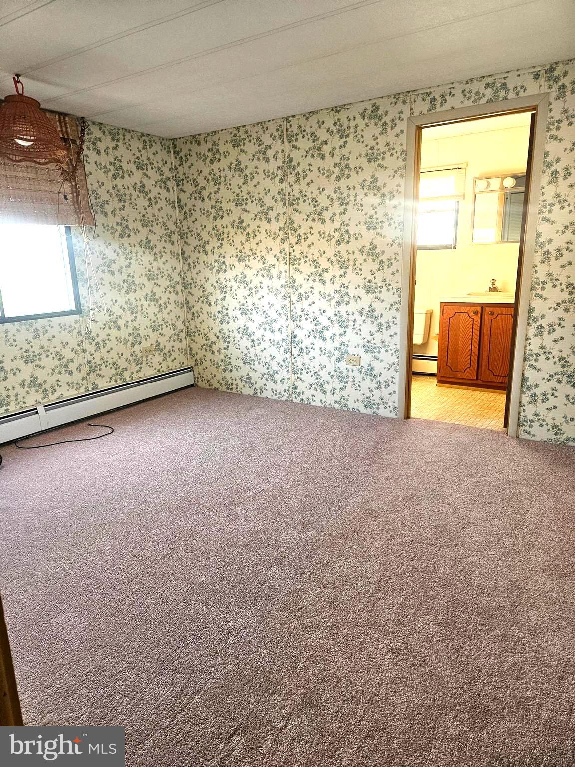 568 Miles Standish Lane Buena, NJ 08310 - Photo 11 of 19 a view of an empty room with a window