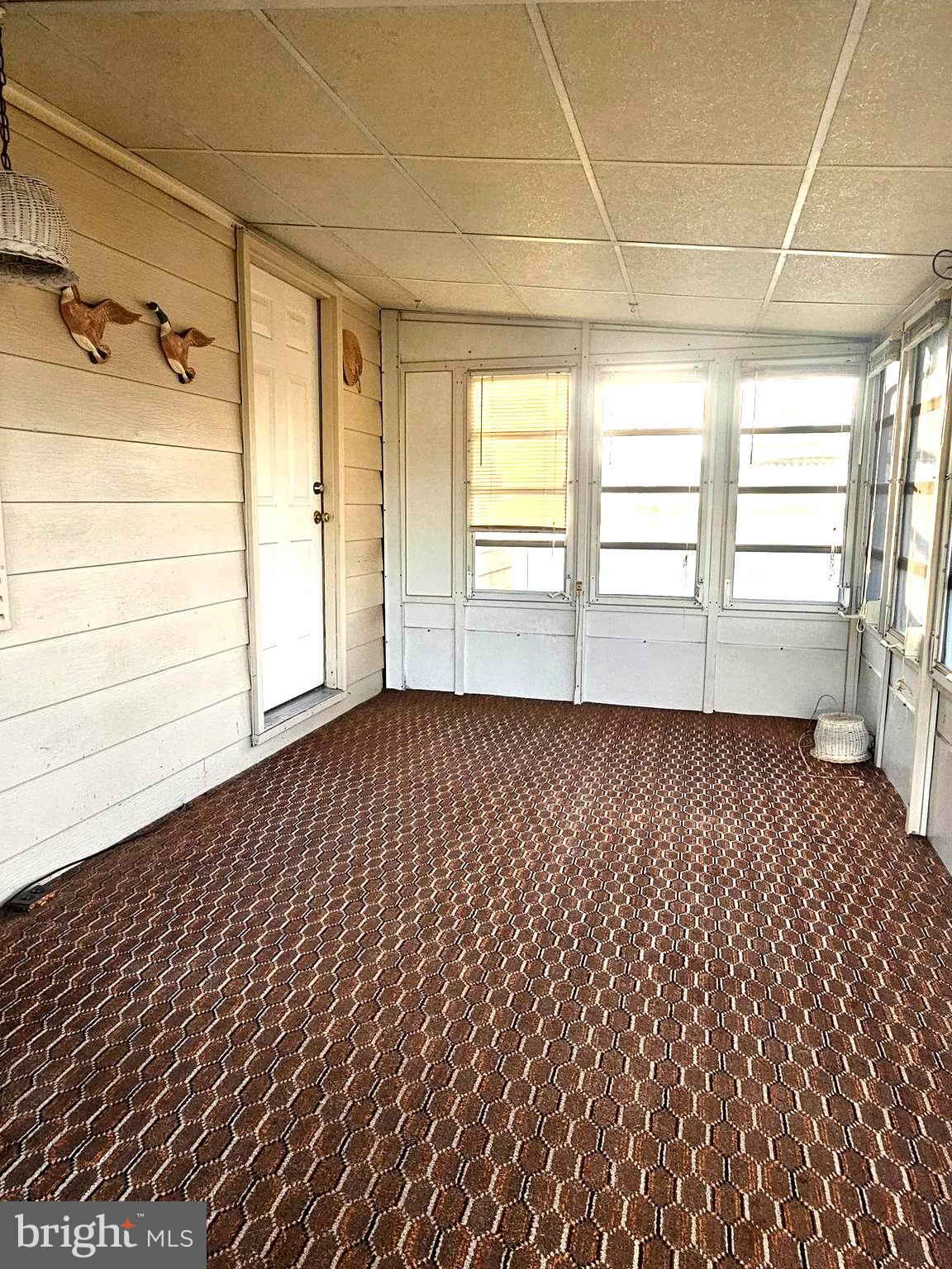 568 Miles Standish Lane Buena, NJ 08310 - Photo 4 of 19 a view of empty room with a window