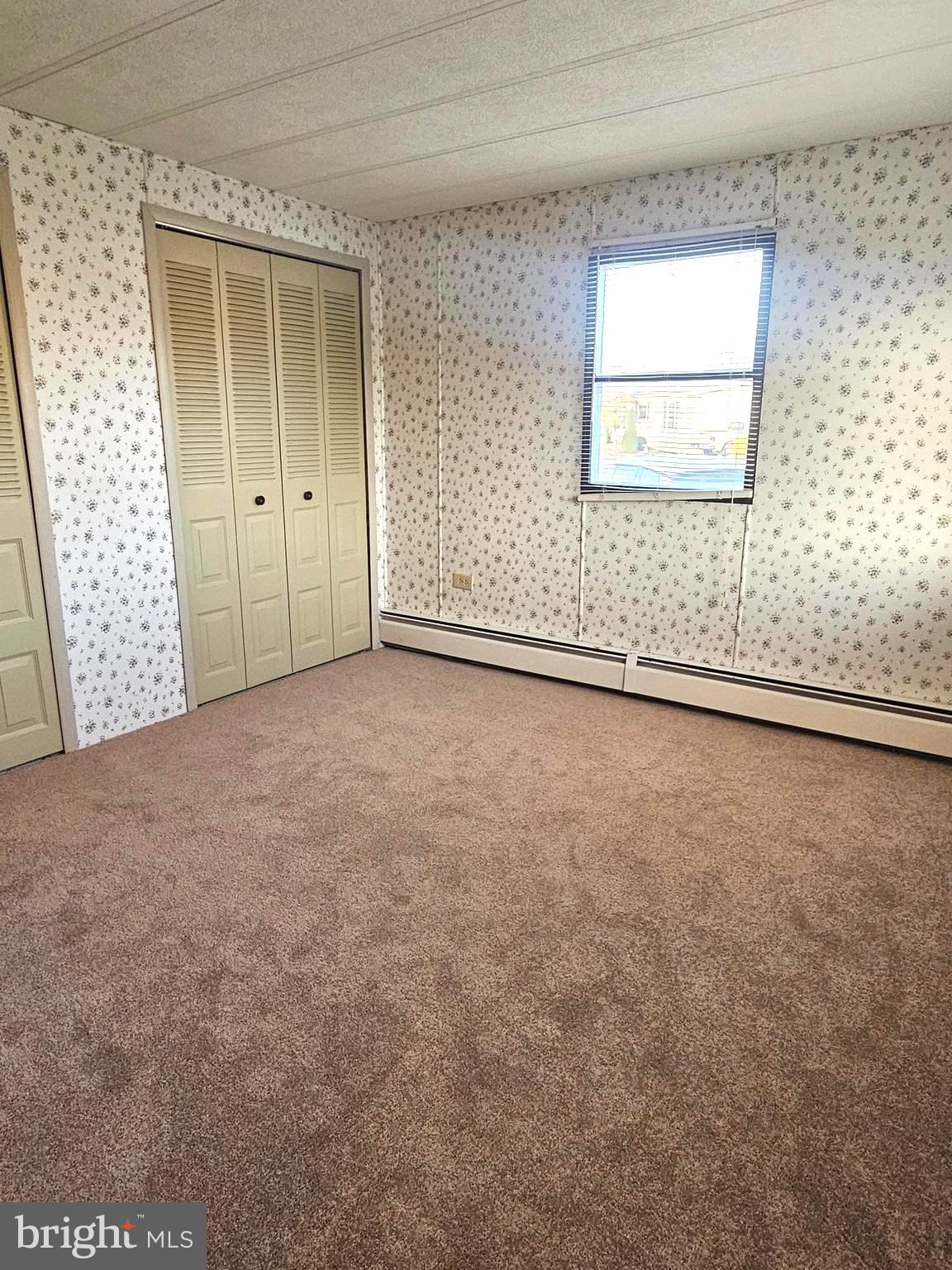 568 Miles Standish Lane Buena, NJ 08310 - Photo 5 of 19 an empty room with windows