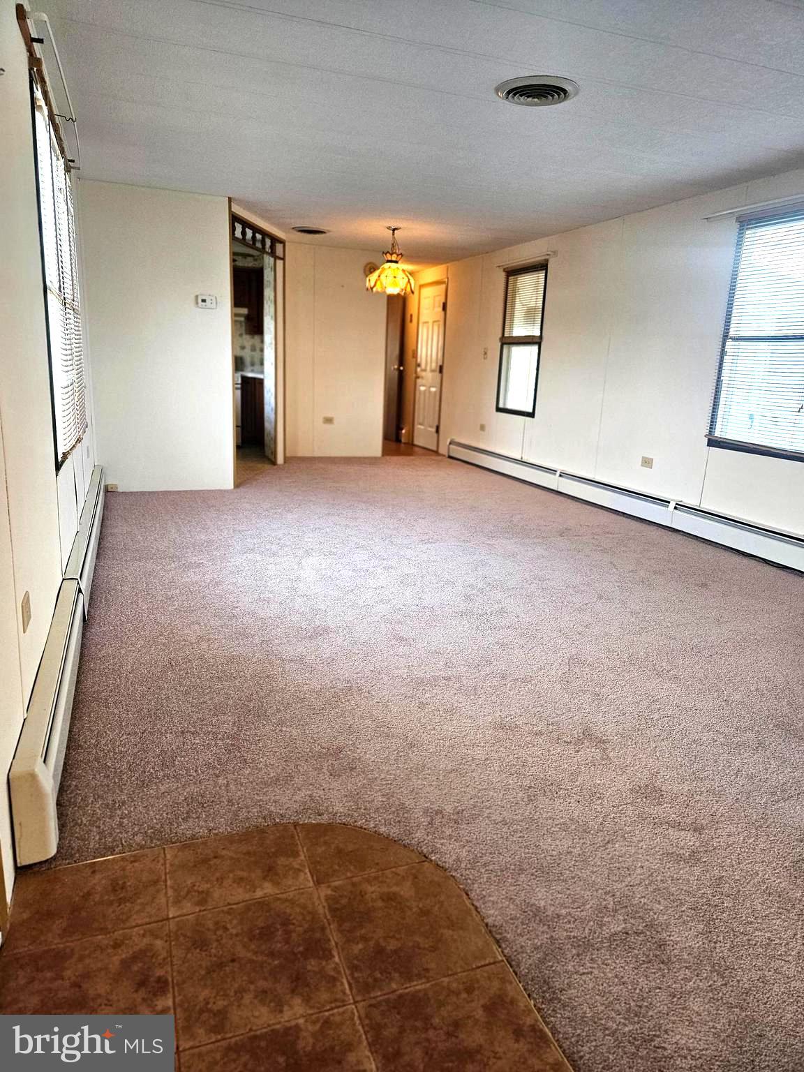 568 Miles Standish Lane Buena, NJ 08310 - Photo 9 of 19 an empty room with windows and closet