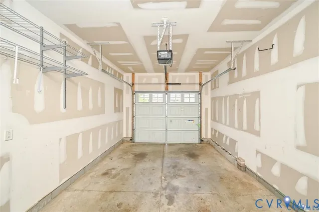 an aerial view of a house with a garden