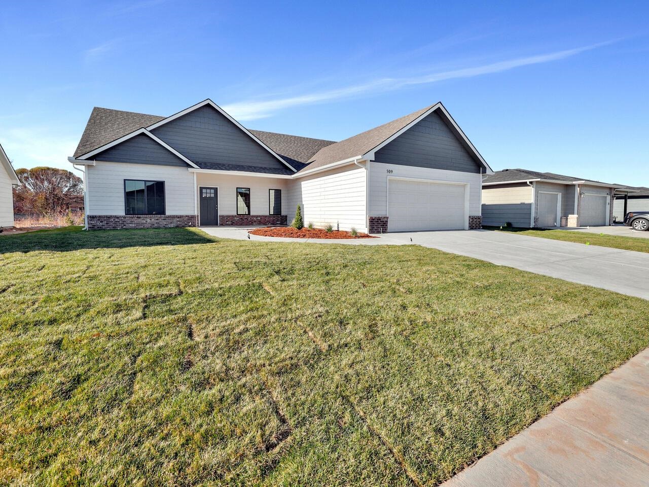 509 South Sweetwater Road Maize, KS 67101 - Photo 2 of 26 Sod, irrigation well, & sprinklers all included!