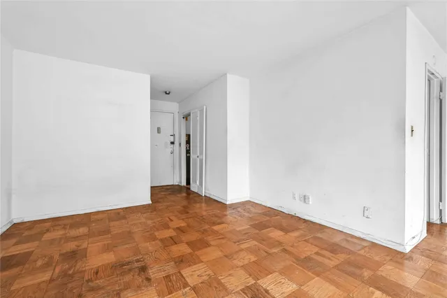 a kitchen with a sink and a refrigerator