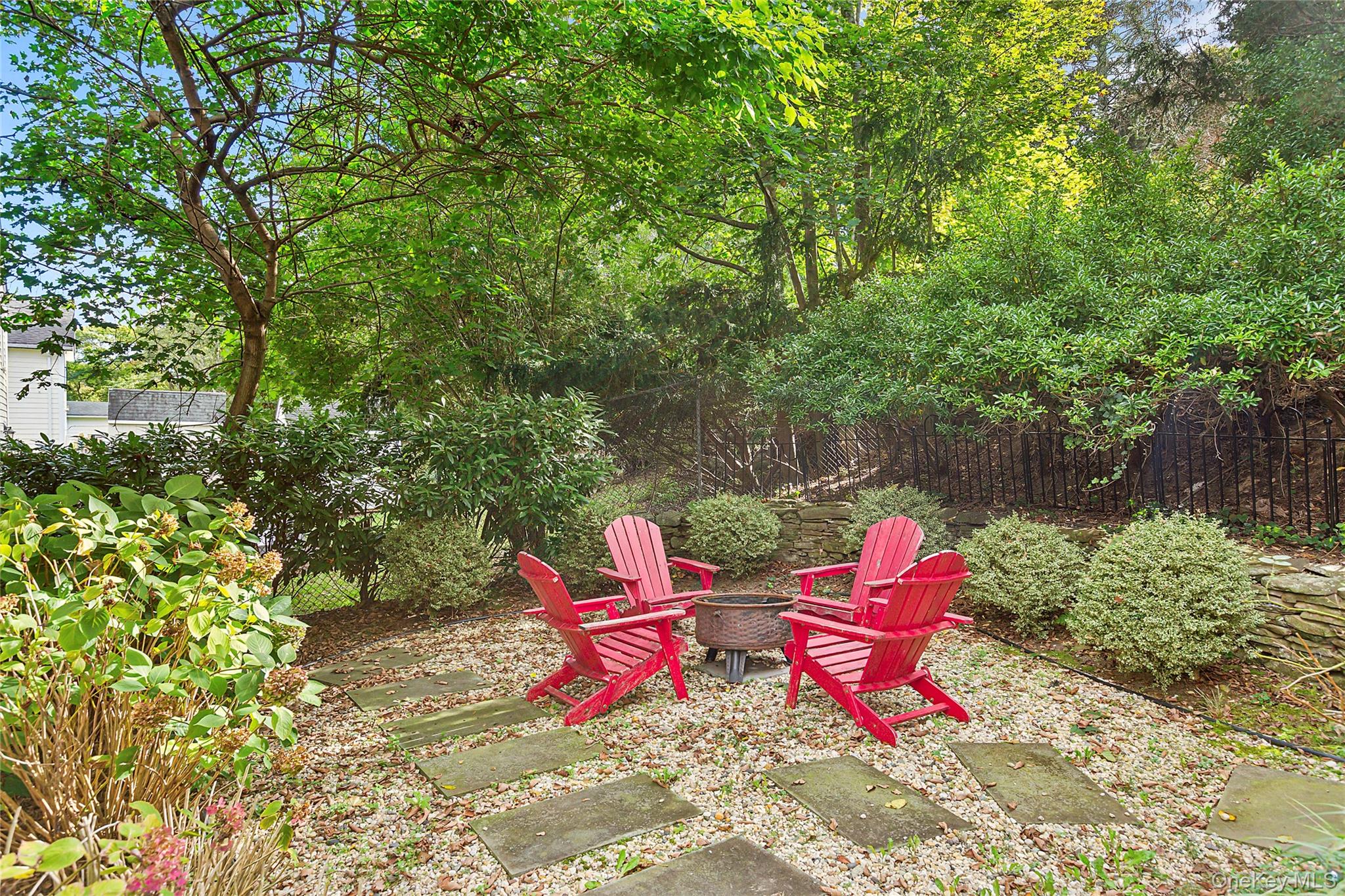 150 Hobart Road Southold, NY 11971 - Photo 10 of 18 a view of a backyard with chairs and table