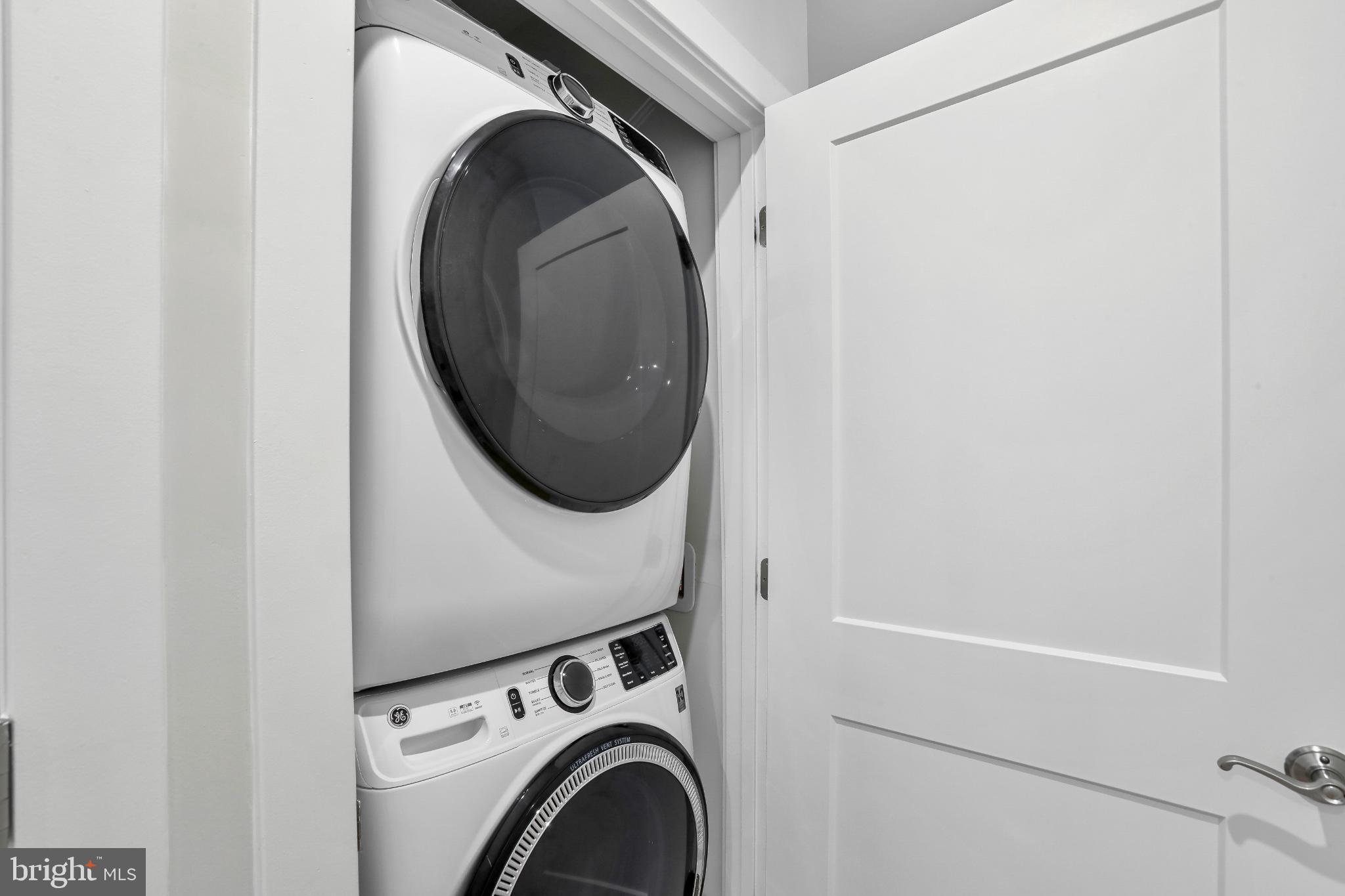 1675 Bandit Loop, Unit 201B Reston, VA 20190 - Photo 16 of 27 a close up view of a washer and dryer
