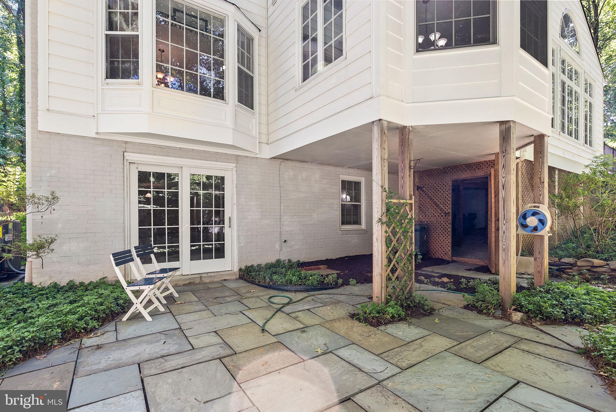 12016 Edgepark Court Potomac, MD 20854 - Photo 54 of 67 Rear patio with a partial view of the great room