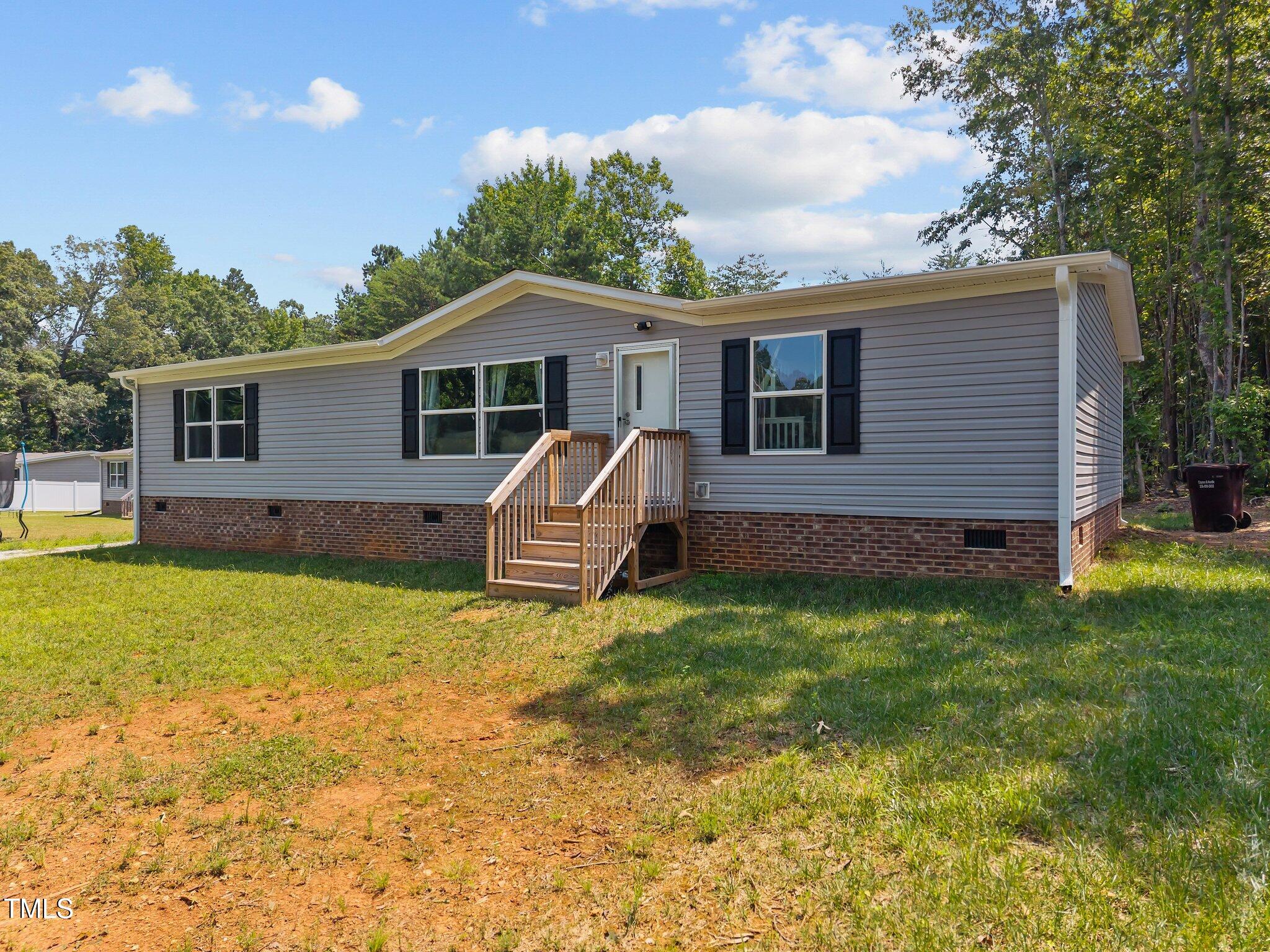 1739 Hurdle Mills Road Roxboro, NC 27573 - Photo 2 of 37 2-web-or-mls-DJI_20250708122528_0597_D