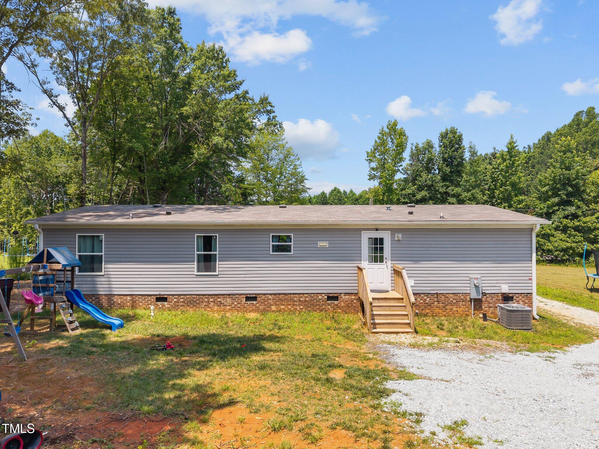 1739 Hurdle Mills Road Roxboro, NC 27573 - Photo 27 of 37 4-web-or-mls-DJI_20250708122614_0599_D