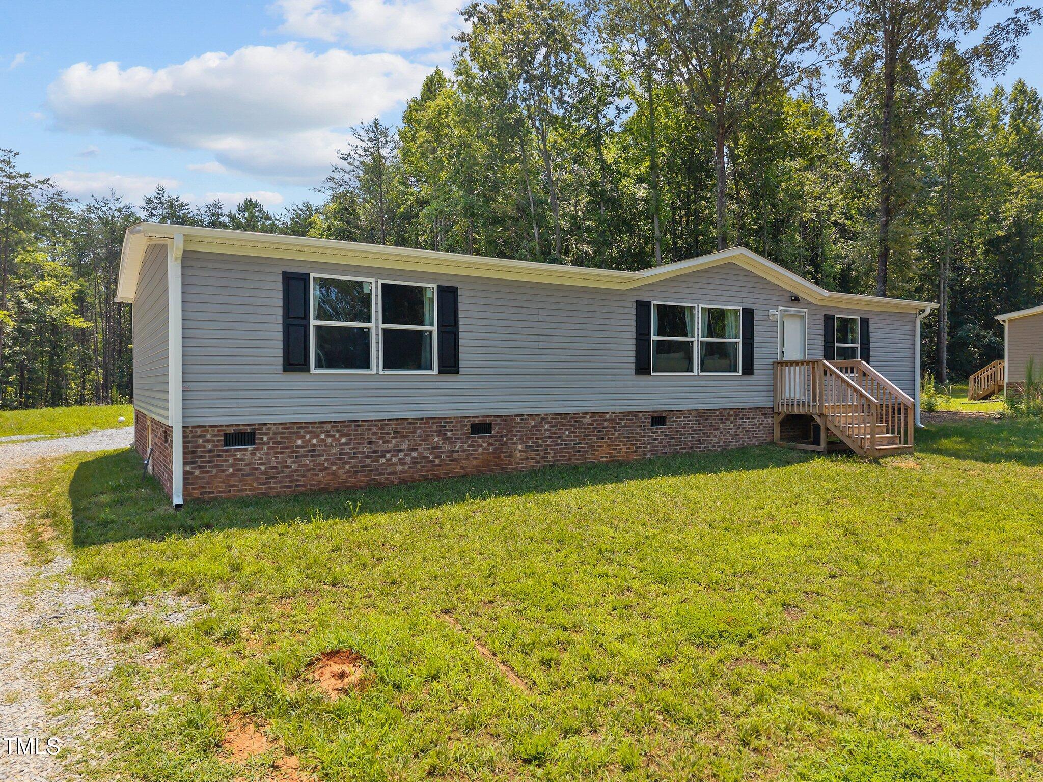 1739 Hurdle Mills Road Roxboro, NC 27573 - Photo 3 of 37 3-web-or-mls-DJI_20250708122539_0598_D