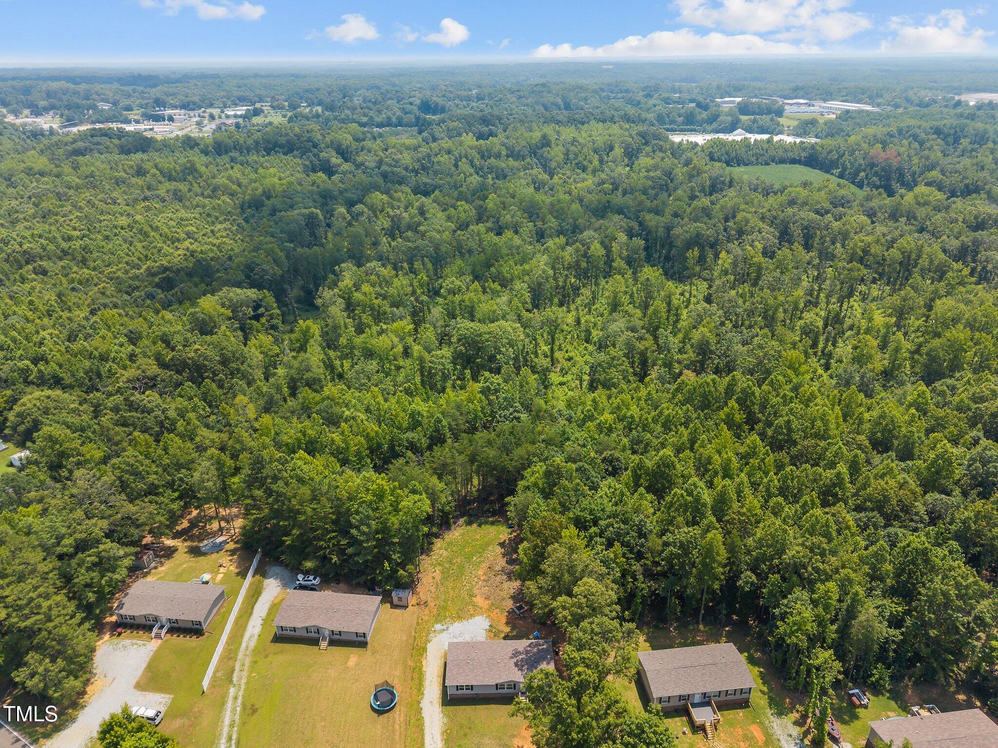 1739 Hurdle Mills Road Roxboro, NC 27573 - Photo 33 of 37 7-web-or-mls-DJI_20250708122709_0602_D