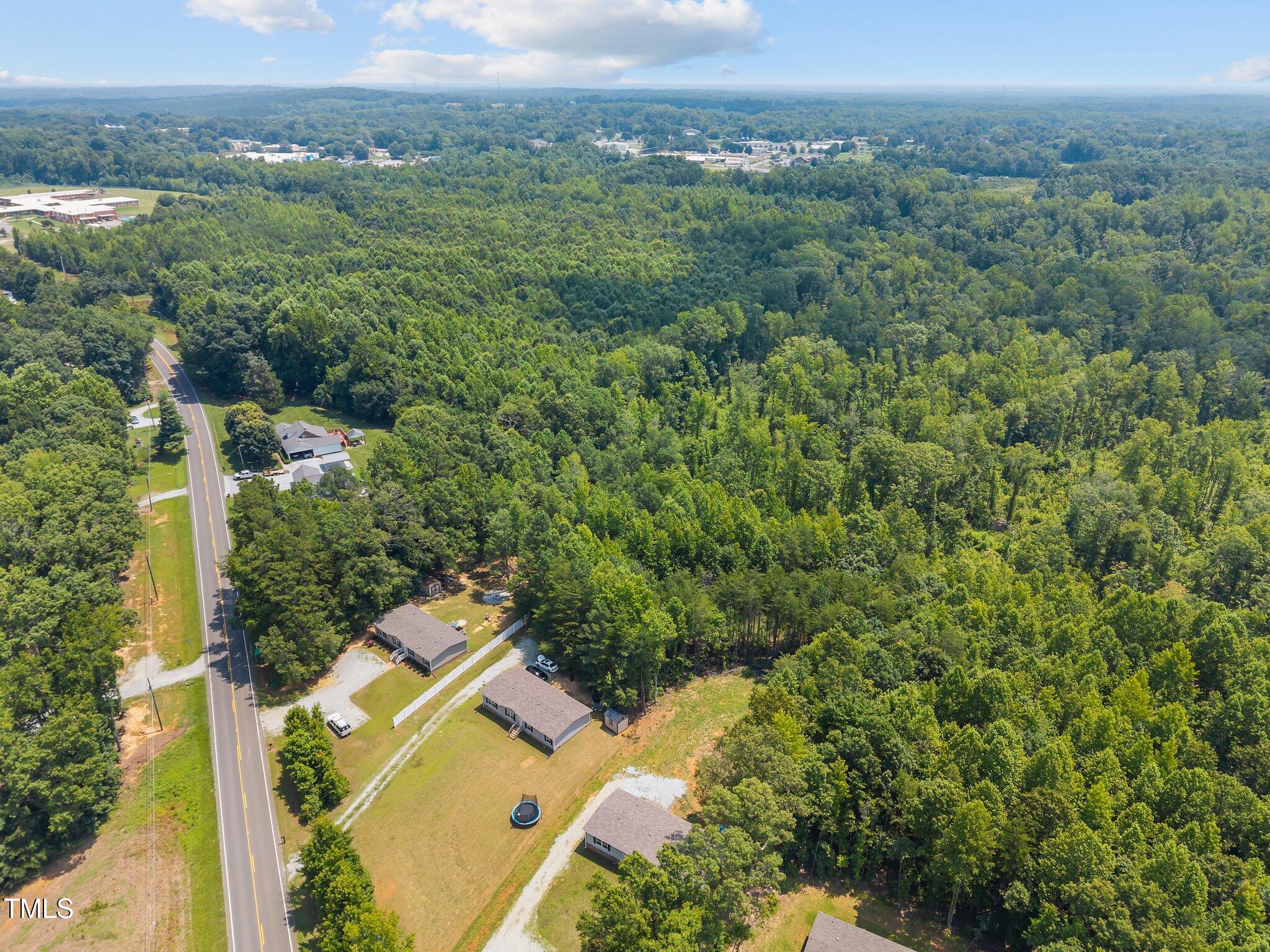 1739 Hurdle Mills Road Roxboro, NC 27573 - Photo 34 of 37 8-web-or-mls-DJI_20250708122718_0603_D