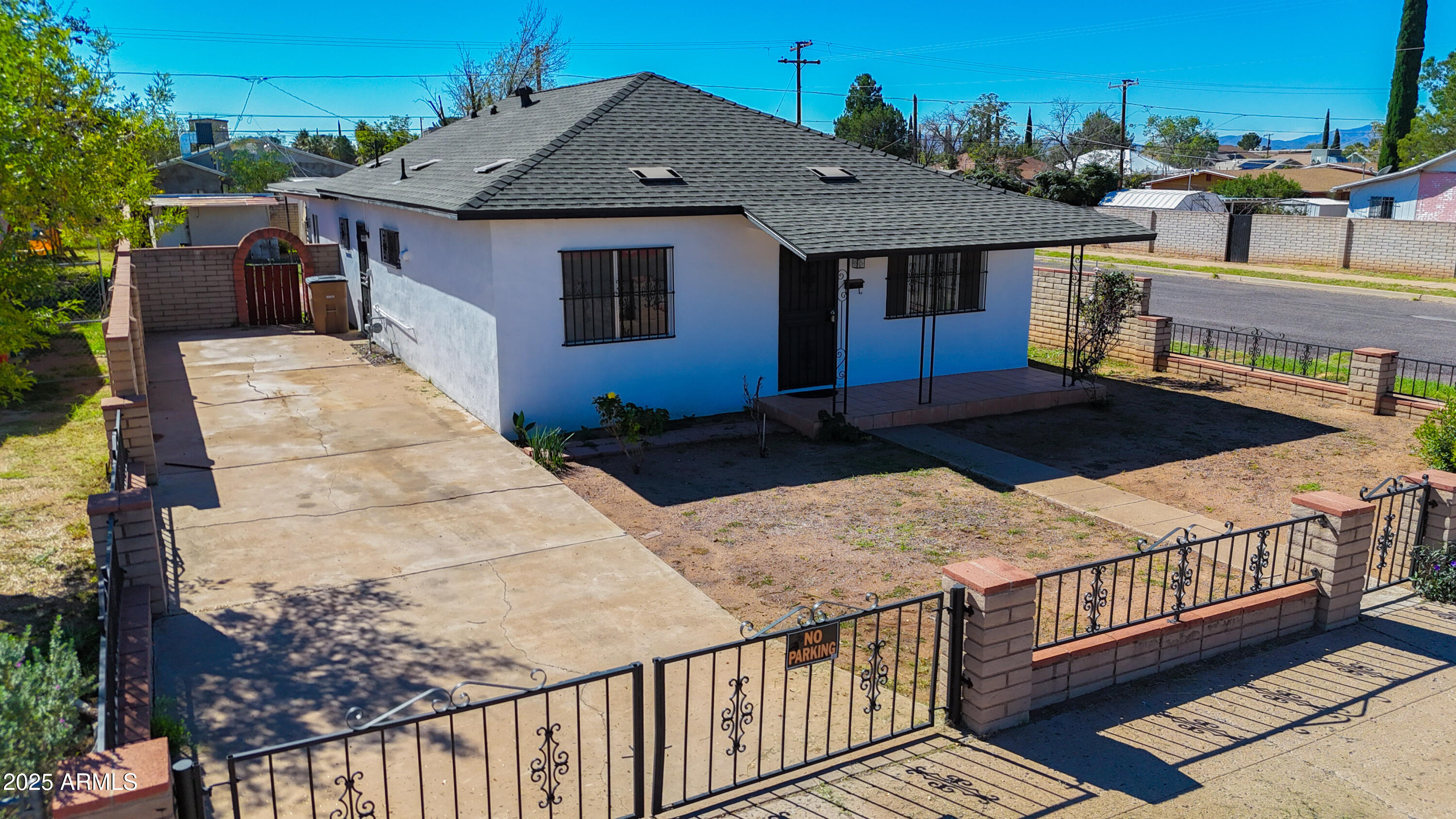 1301 East 14th Street Douglas, AZ 85607 - Photo 2 of 45 a view of a house with wooden deck