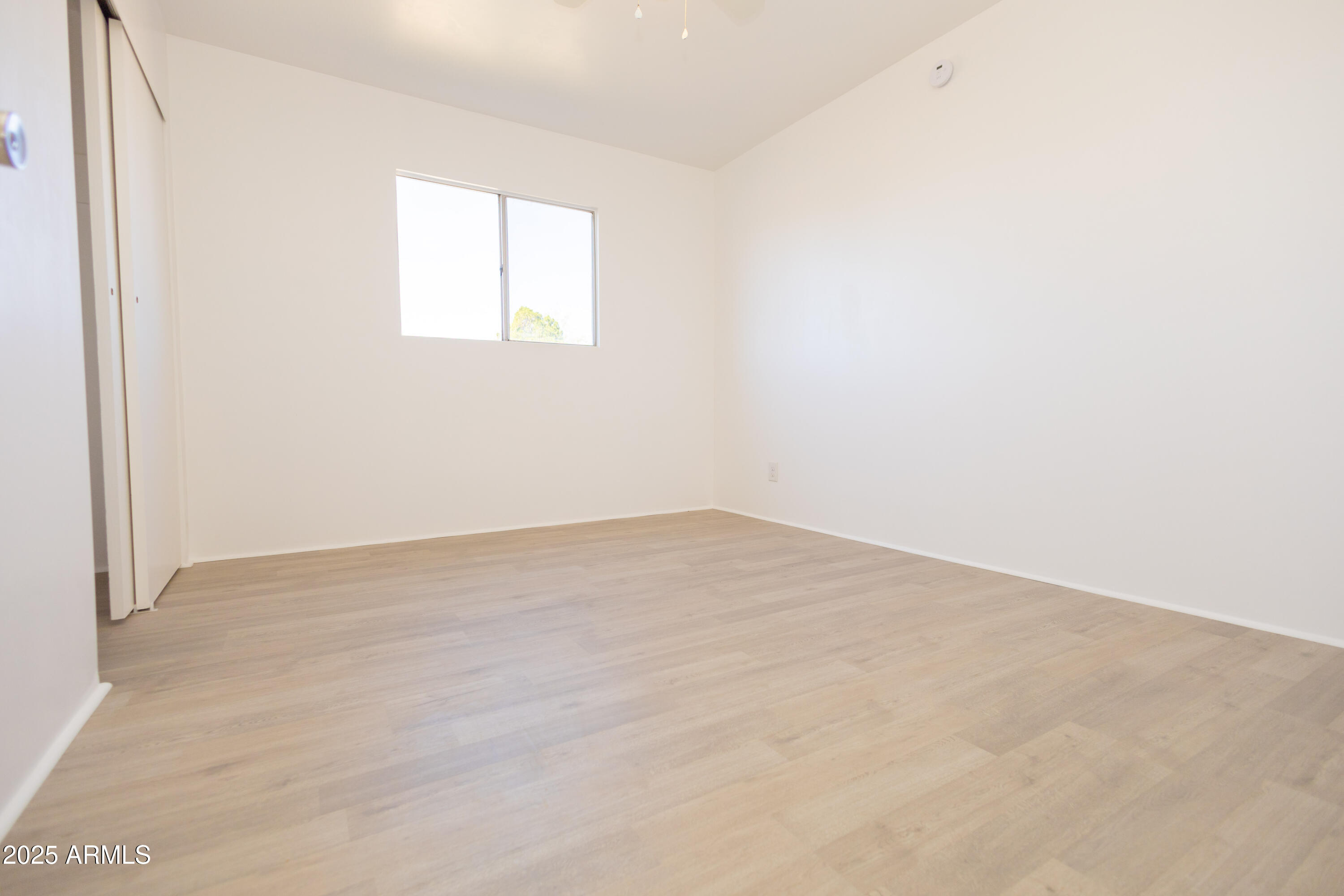 1301 East 14th Street Douglas, AZ 85607 - Photo 28 of 45 an empty room with a window