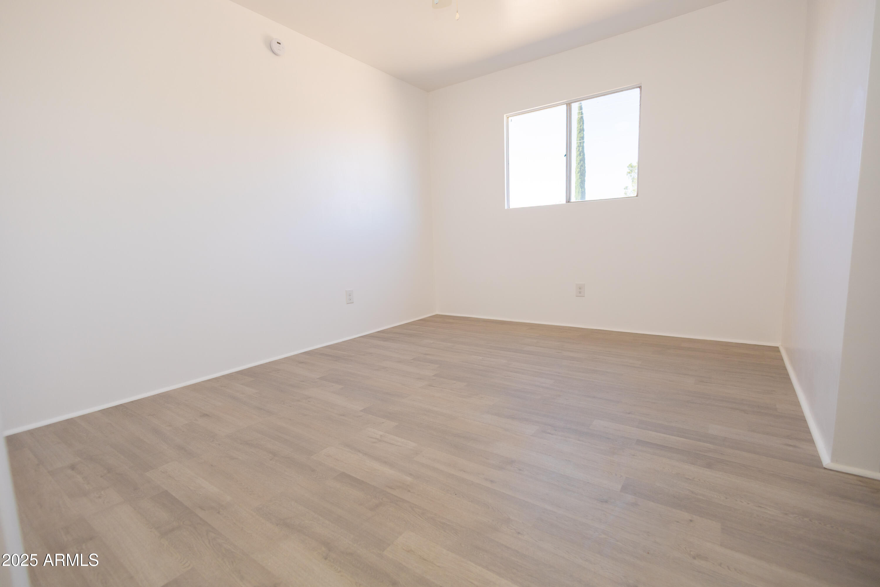 1301 East 14th Street Douglas, AZ 85607 - Photo 30 of 45 an empty room with a window