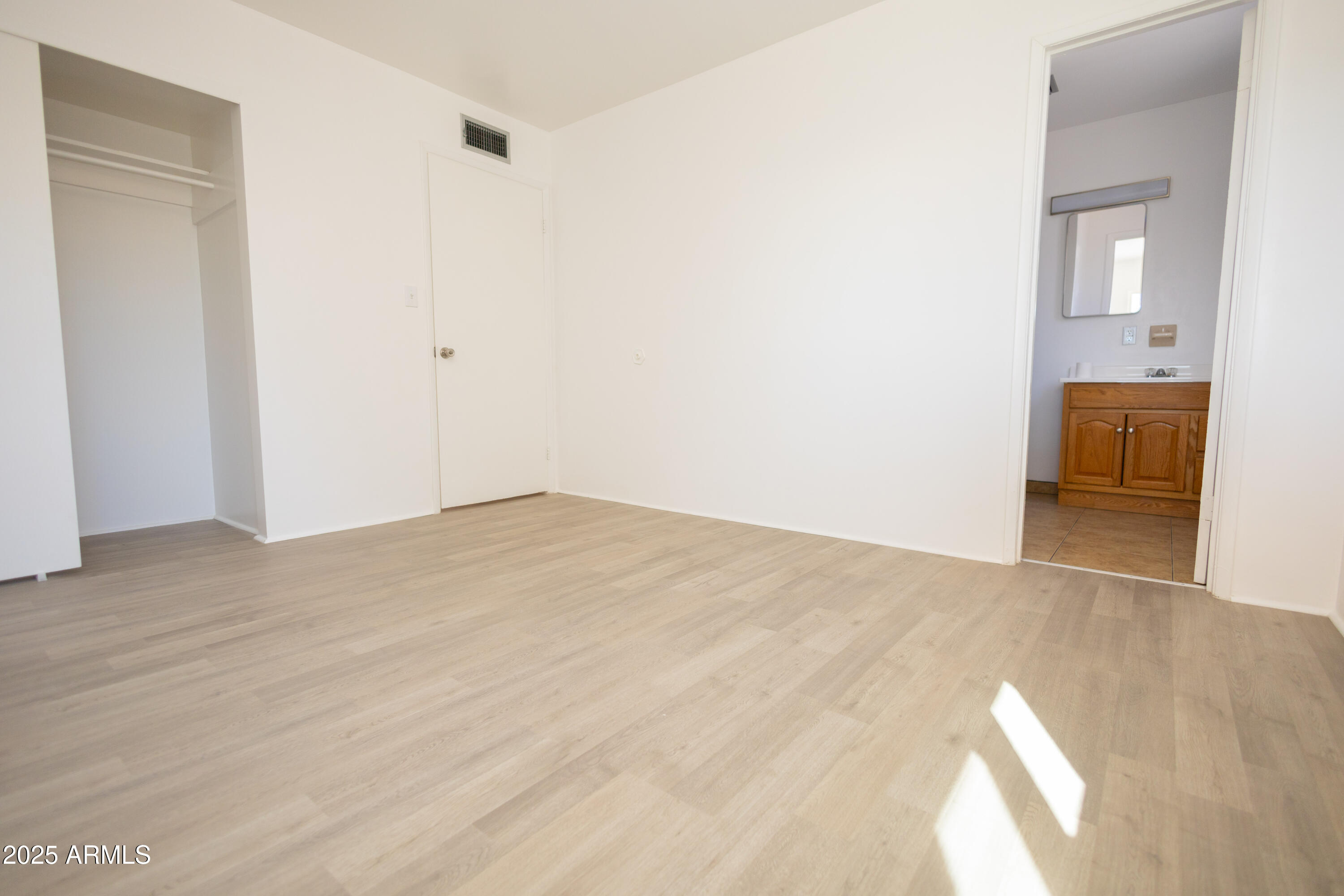 1301 East 14th Street Douglas, AZ 85607 - Photo 32 of 45 a view of empty room with wooden floor
